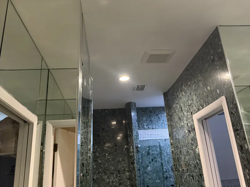 Bathroom finished in green granite