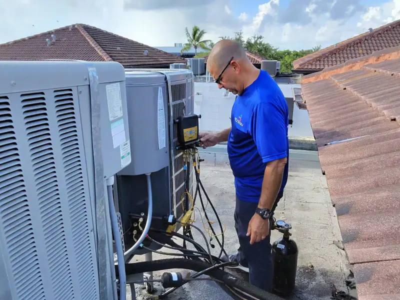 Checking refrigerant pressures on a rooftop system