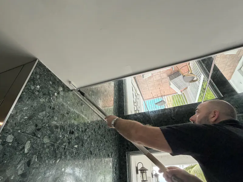 Fitting a shower enclosure against granite
